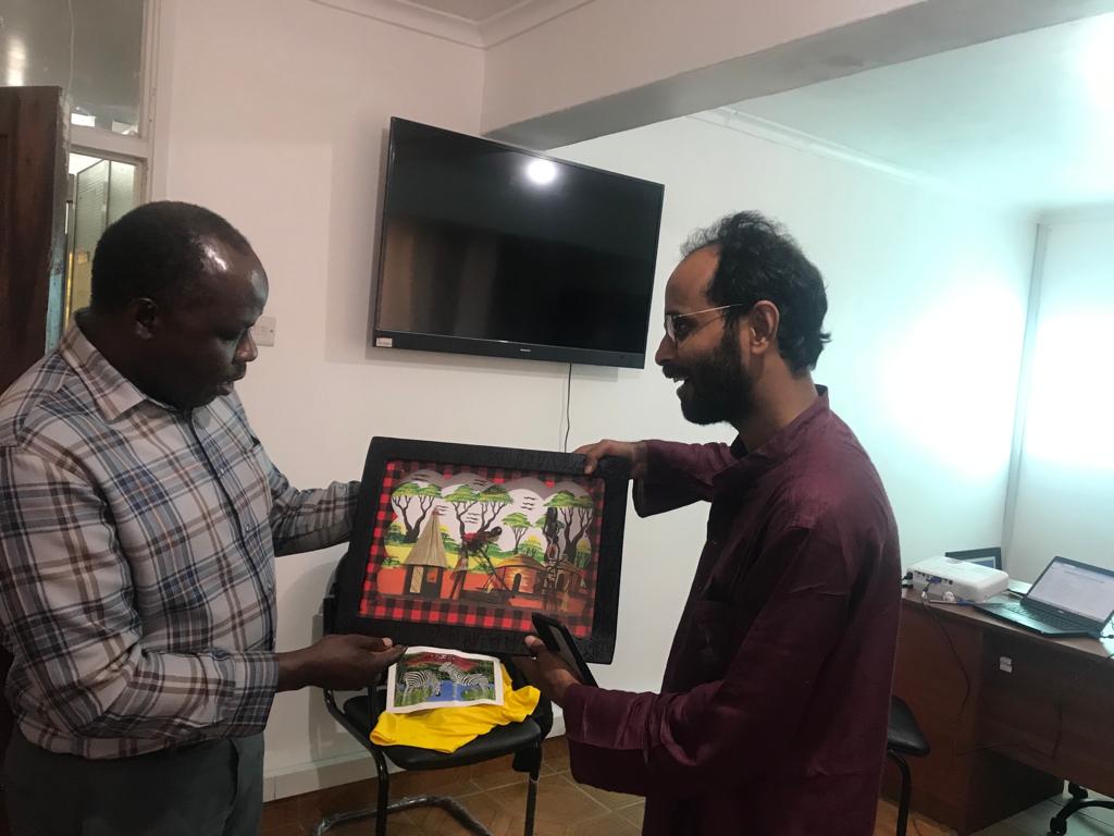 Subho presented with a gift by Prof. Ikwba